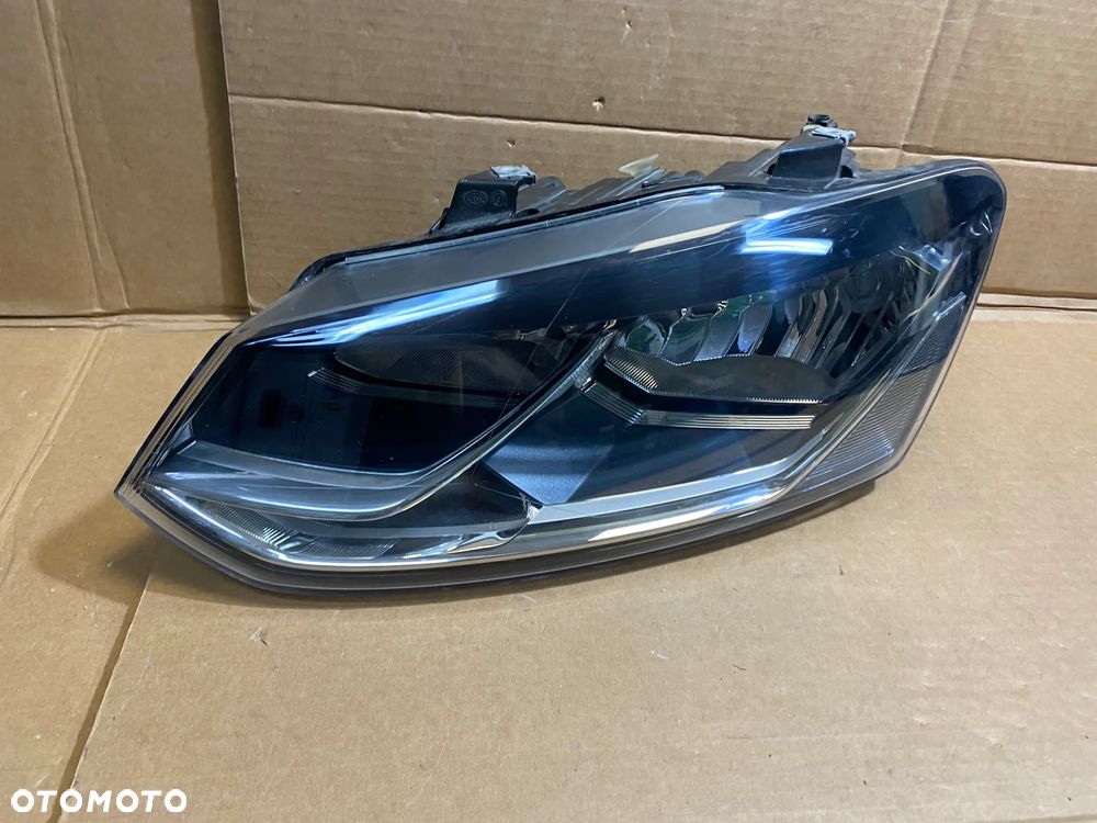 lampa polo 6C 2xH7 lewa eu cała - 1