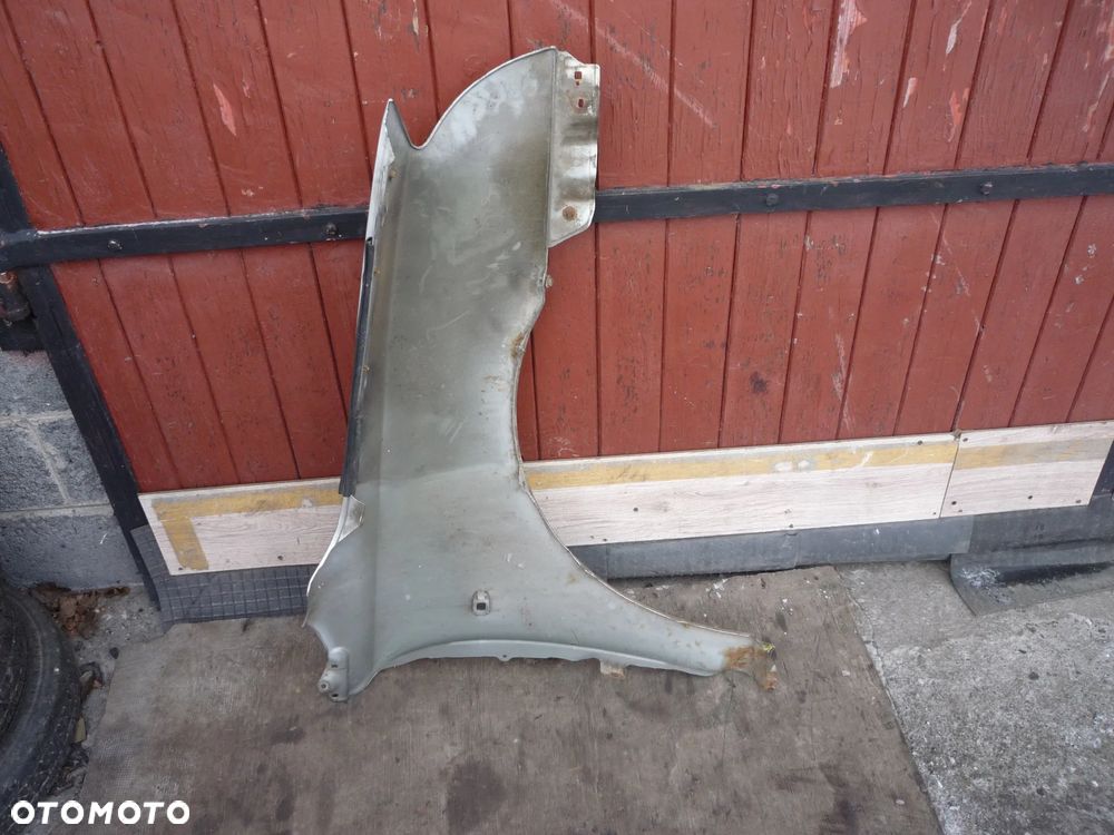 TOYOTA AVENSIS T25 BŁOTNIK LEWY 1C0 - 3