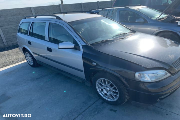 Vas expansiune Opel Astra G  [din 1998 pana  2009] seria wagon 5-usi 1.7 DTi AT (75 hp) - 2