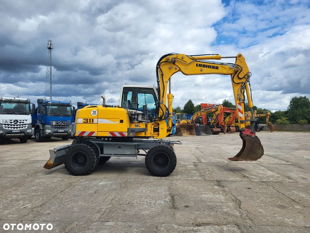 Liebherr A 311 spr z Niemiec