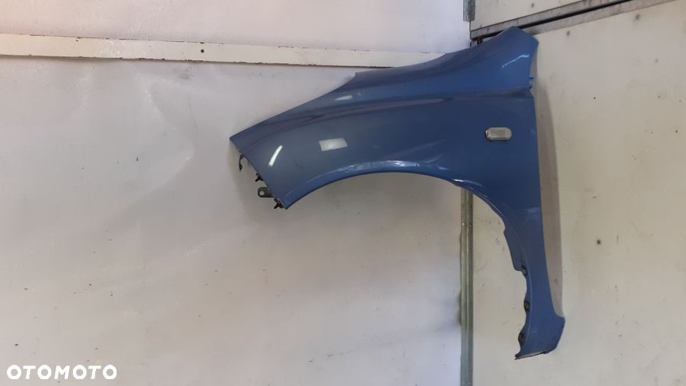 * NISSAN MICRA K12 BŁOTNIK PRZÓD PRZEDNI LEWY T12 - 1