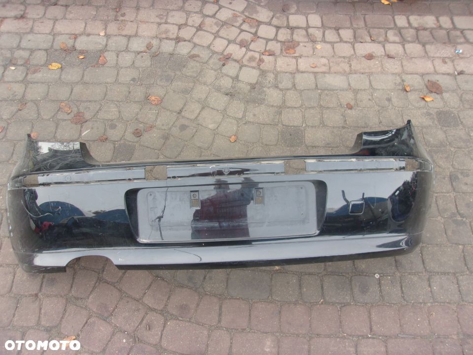 ZDERZAK TYLNY BMW E81 E87 3-D 5-D - 1