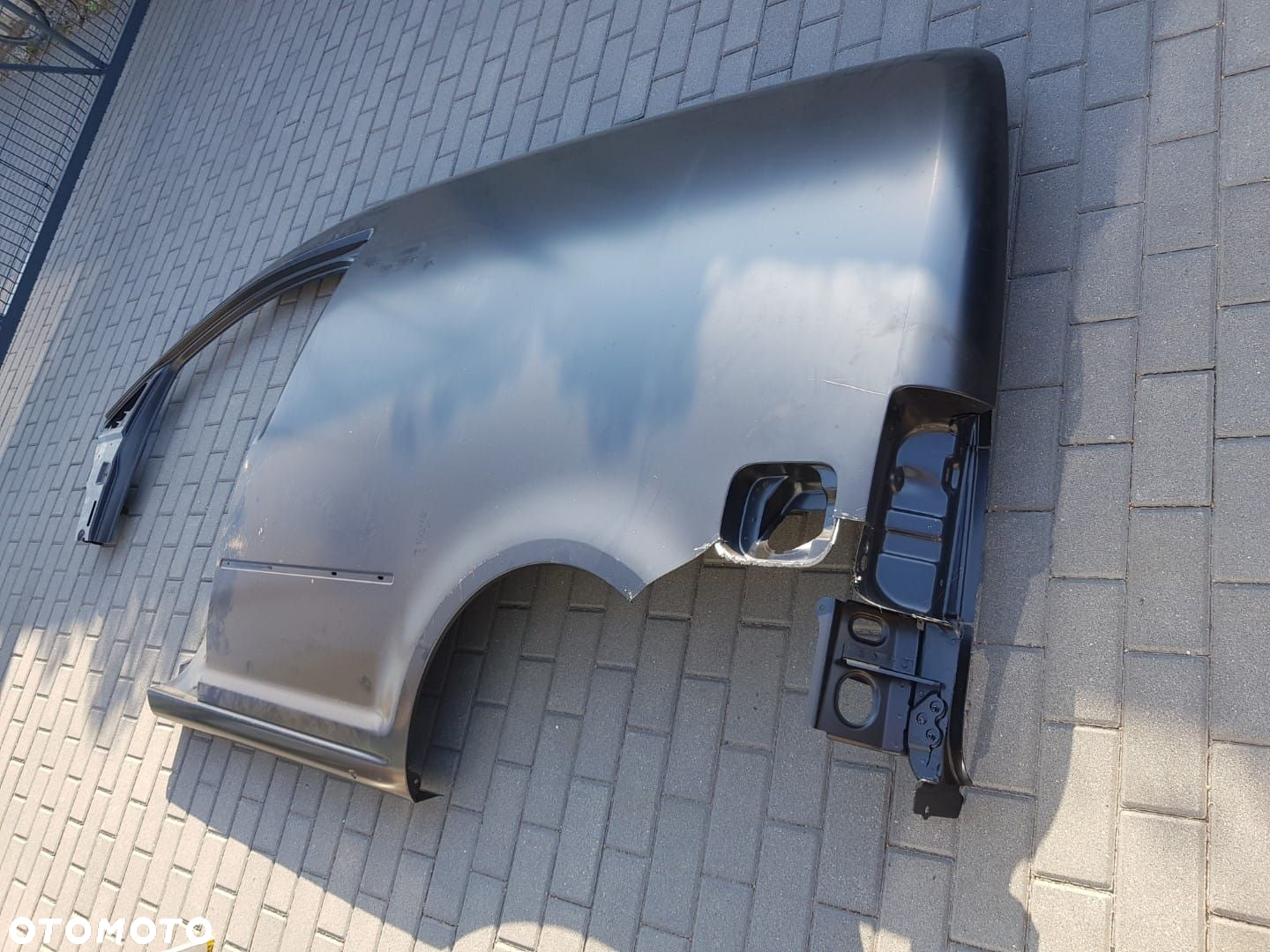 NOWY LEWY BŁOTNIK VW CADDY III 3 4 IV 2K 2K5 04-20r POSZYCIE SŁUPEK  LEWA 2K5809603A - 2