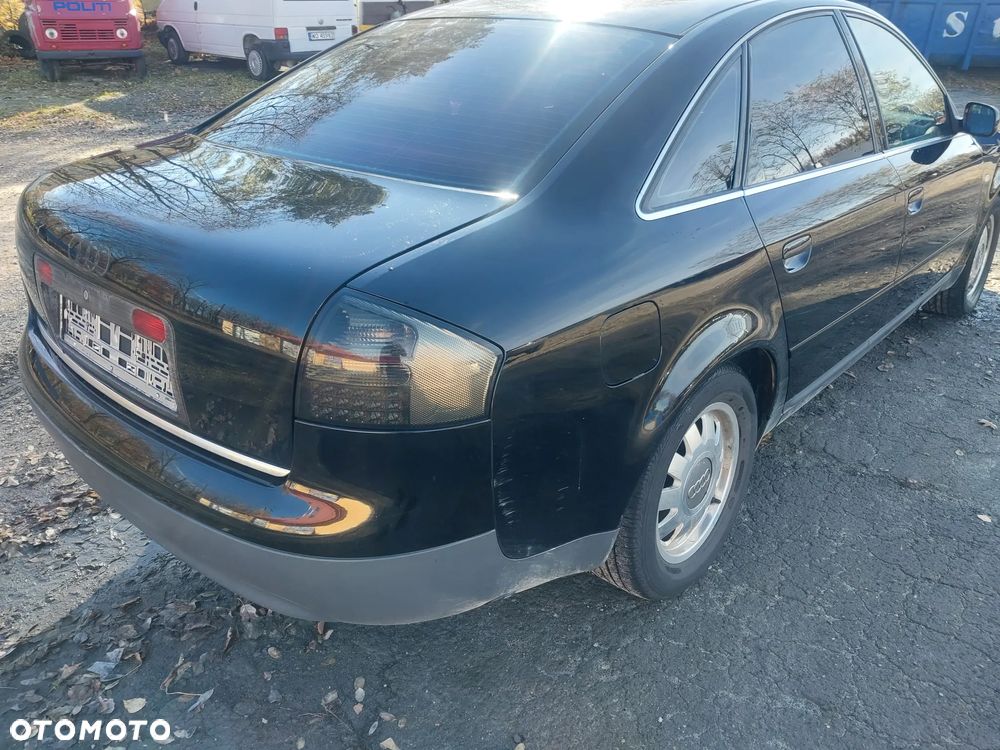 Audi A6 C5 sedan silnik kompletny 1.8 Turbo AEB turbina turbosprężarka cewka wiązka przepustnica przepływomierz kolektor skrzynia biegów DHW sprzęgło dwumasa drzwi lewe prawe klapa błotnik lusterko kolor LY9B czarny maglownica wydech tłumik lampa tył tylna blenda belka rura dolotowa przewód podłokietnik sterownik panel boczki fotele grzane alufelgi szyba dekory NA CZĘŚCI WSZYSTKIE CZĘŚCI - 11