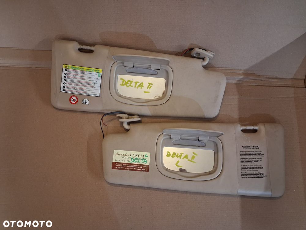 Osłony przeciwsłoneczne LANCIA DELTA III prawy lewy kpl - 1