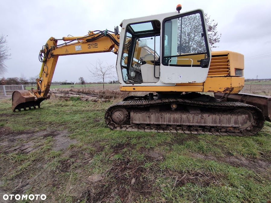 Liebherr R312 - 1