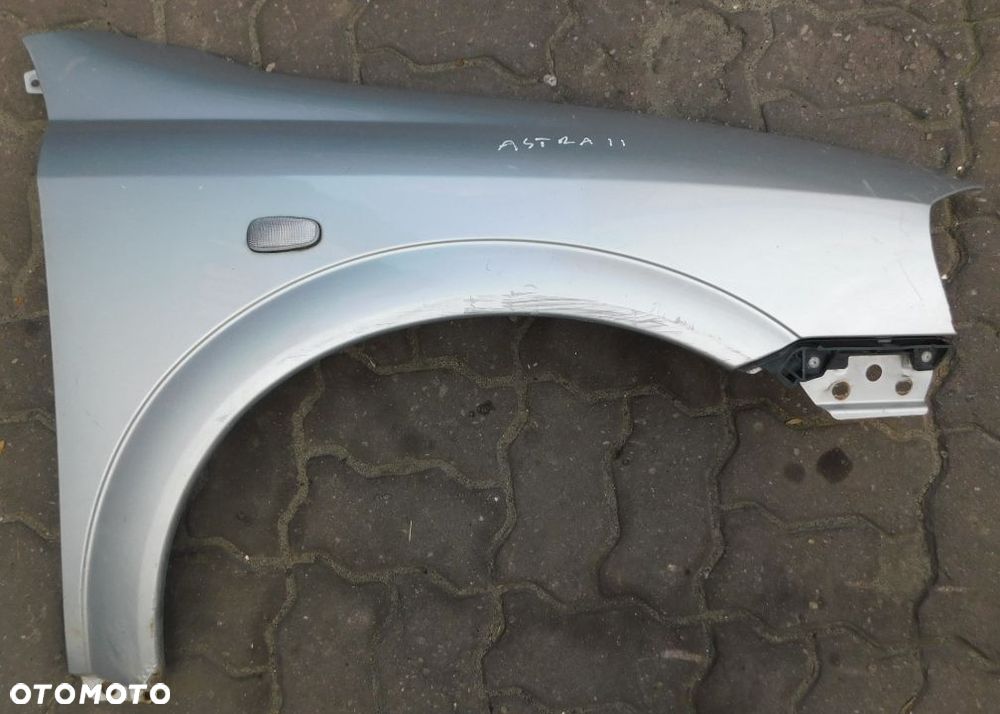 błotnik przód prawy OPEL ASTRA II Z147 - 1