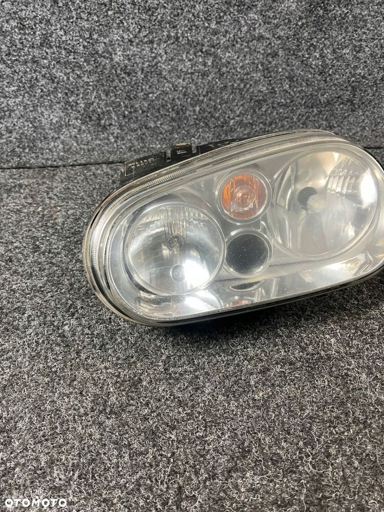 reflektor lewy przód vw golf IV - 2