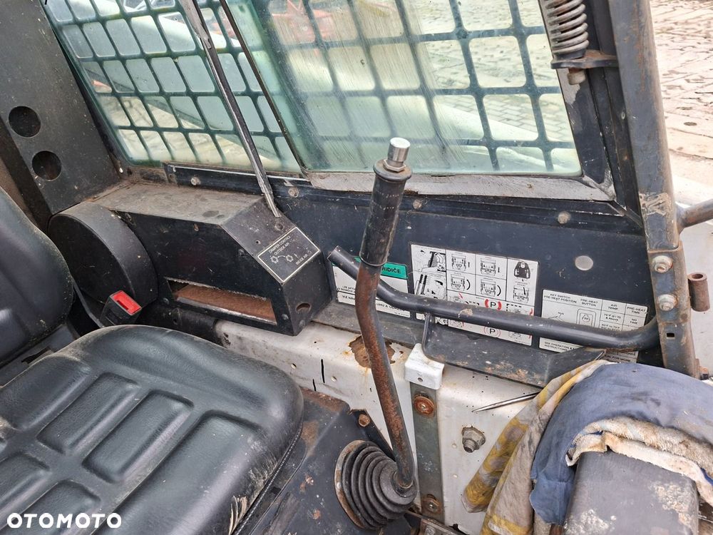 Bobcat 553 4X4 + Melroe Ingersoll-Rand 725S B/H - 15