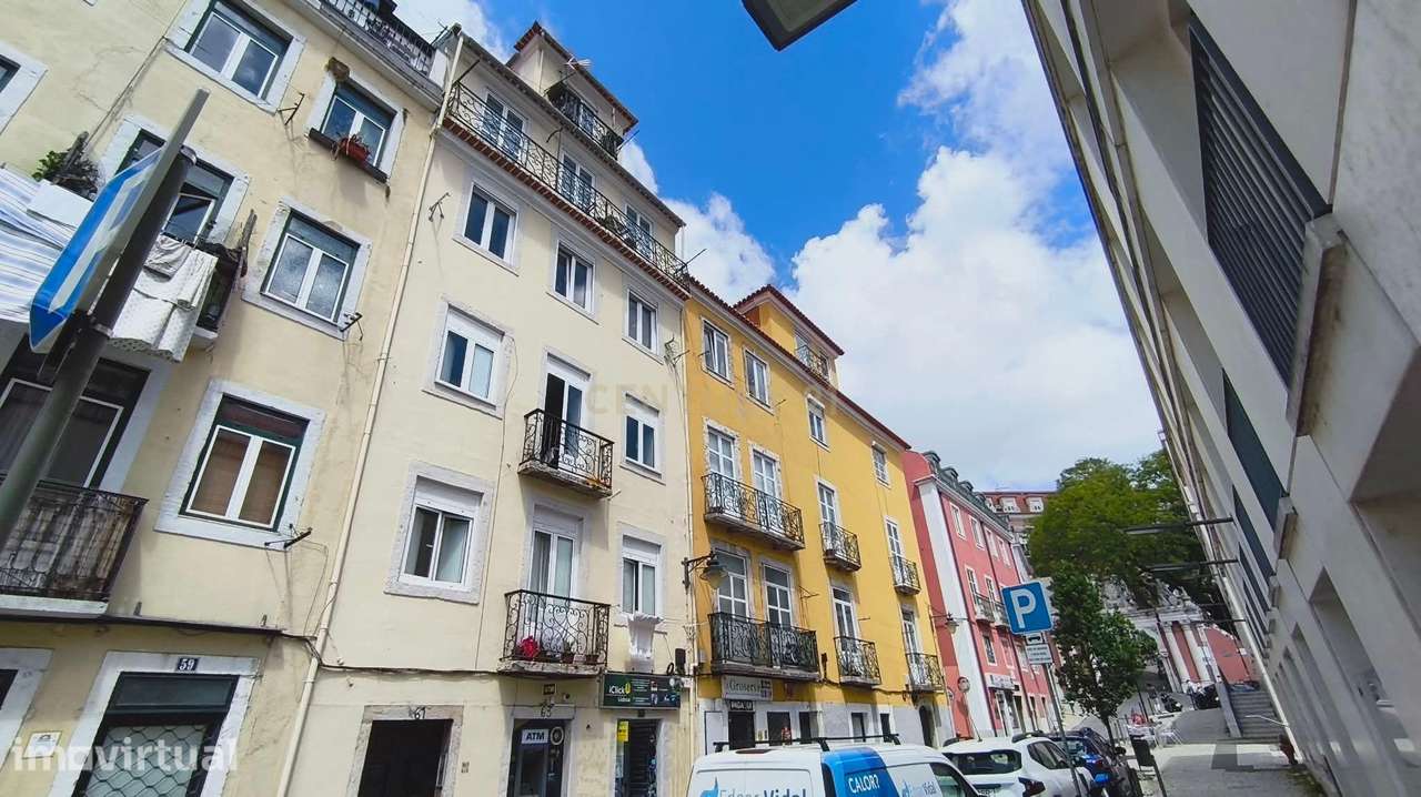 Apartamento com História e Vista Infinita na Baixa Pombalina em Lisboa - Grande imagem: 2/12