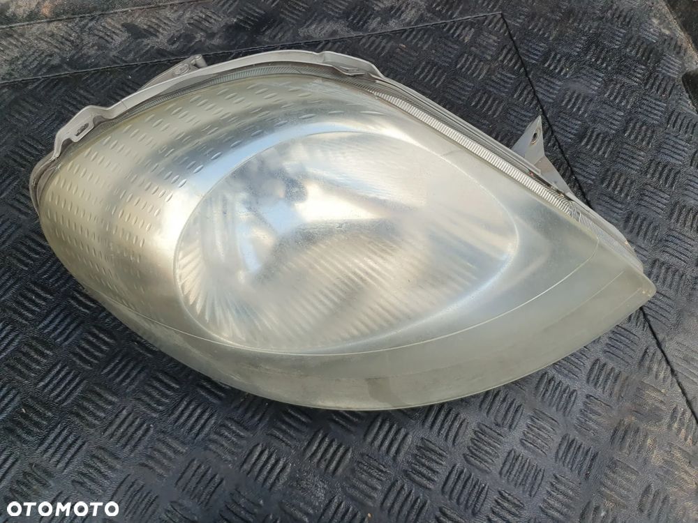 OPEL VIVARO RENAULT TRAFIC II 06R LAMPA PRAWY PRZÓD 7700311374 - 1