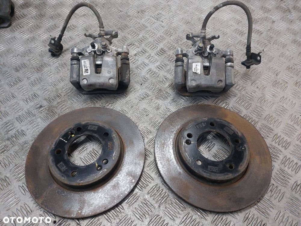 TARCZE HAMULCOWE TYŁ + ZACISKI KIA CEED III - 1