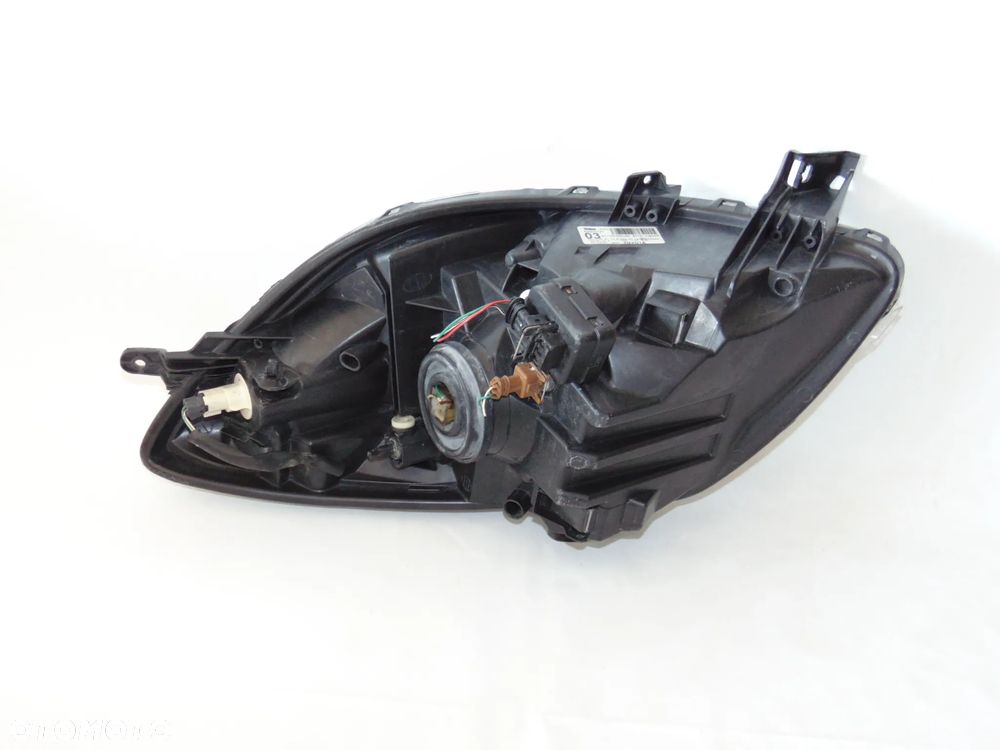 ORYGINAŁ lampa przednia przód lewa prawa Toyota Yaris 2 II 05-09r - 16