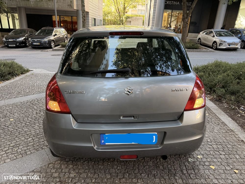 Suzuki Swift 1.3 DDiS Quiksilver - 5