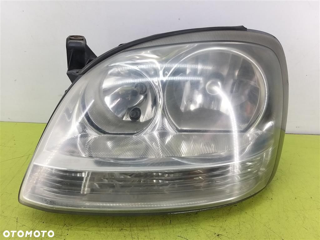 Reflektor lampa przód lewa Nissan Almera Tino 2000-2004R 964323 - 1