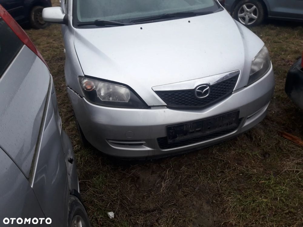 Mazda 2 02-07 DY  Maska zderzak pas fotel zamek  kierownica lampa atrapa  zamek szyba klapa w kolor 22V - 1