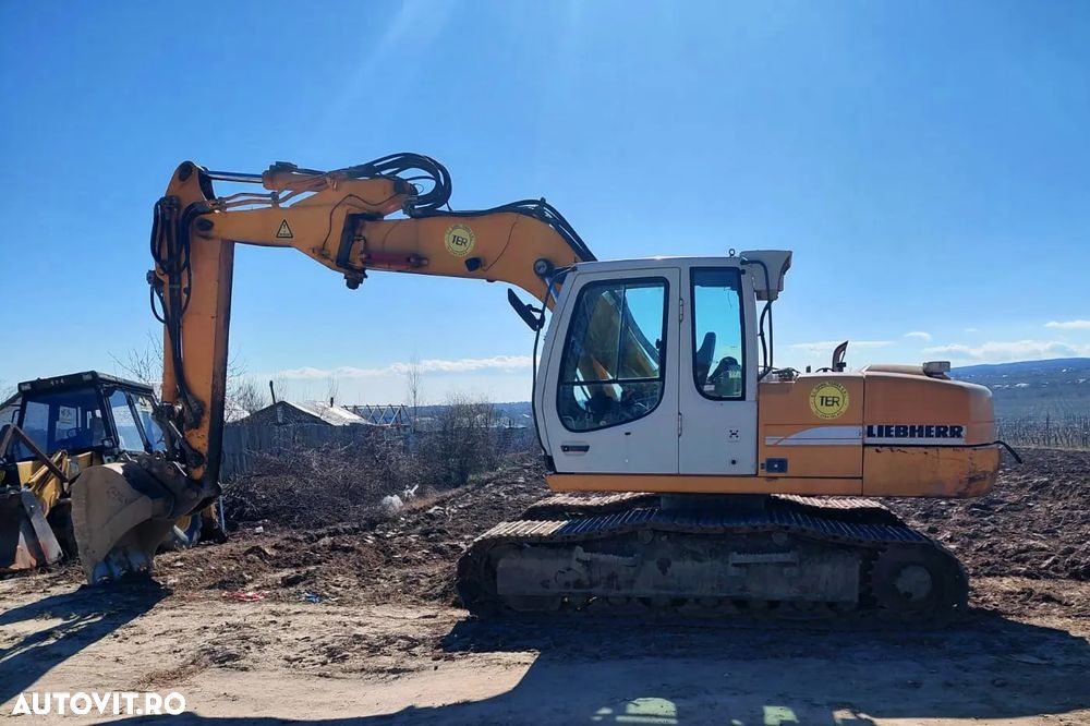 Liebherr R317 Litronic Excavator pe senile - 1