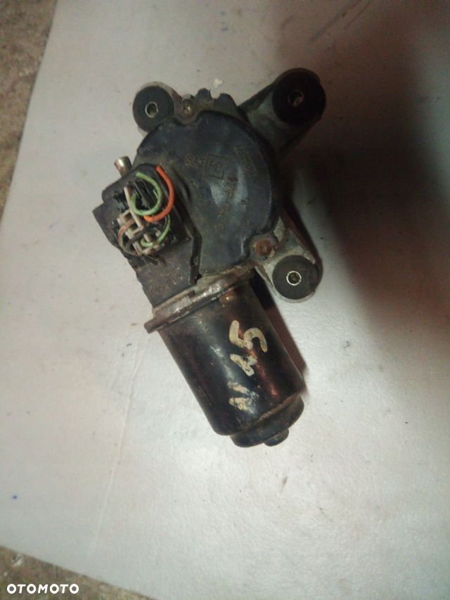 Nissan ALMERA N15 SILNICZEK WYCIERACZEK PRZEDNICH PRZÓD ORYG. - 1