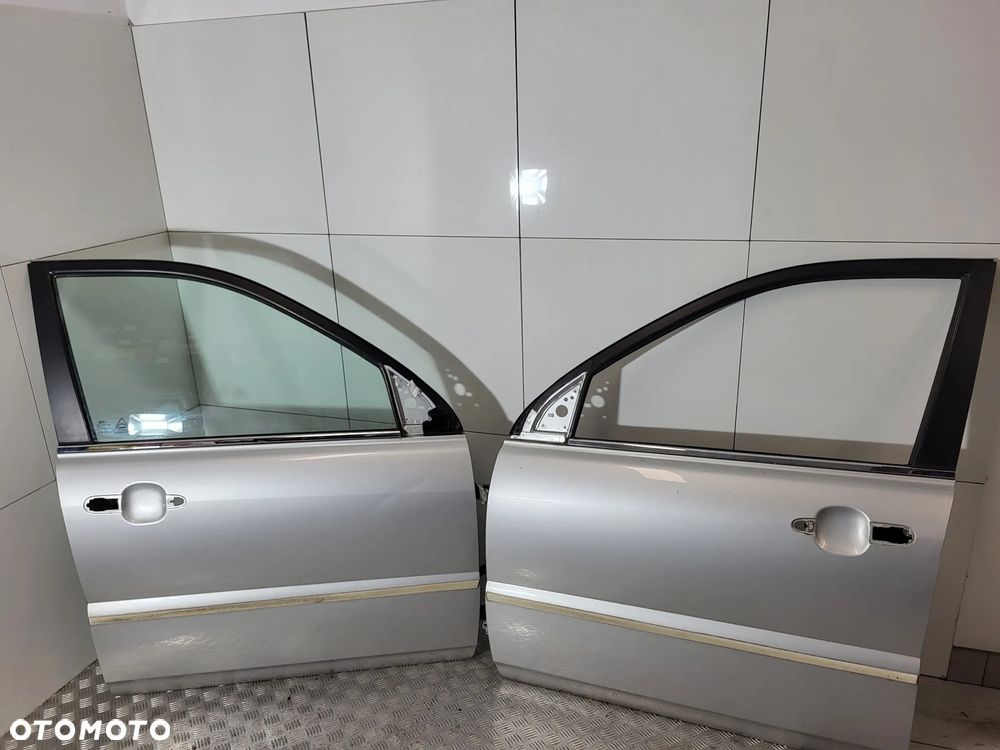 Kia Sportage II Drzwi Lewe Prawe Przód Tył - 1