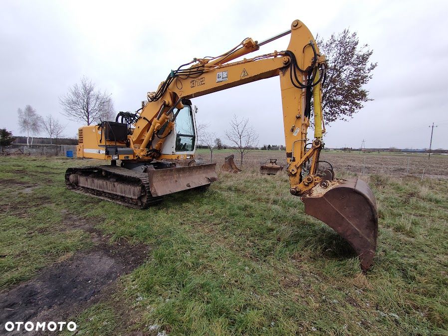 Liebherr R312 - 6