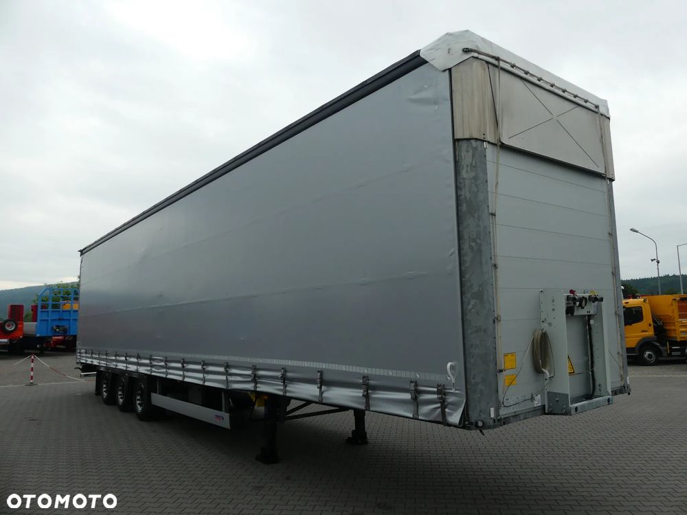 Schmitz Cargobull MEGA / FIRANKA / OŚ PODNOSZONA / OGUMIENIE 80% / - 12