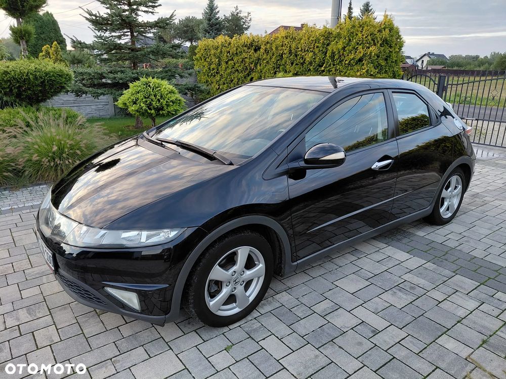 Honda Civic 1.4i-DSi Comfort - 1