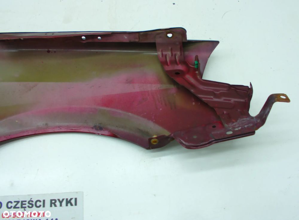Nissan Primera P12 Błotnik prawy lewy przód bordowy - 9
