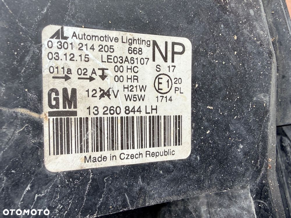 Lampa przednia OPEL ZAFIRA B LIFT JASNA LEWA EUROPA ORYGINALNA AL - 4