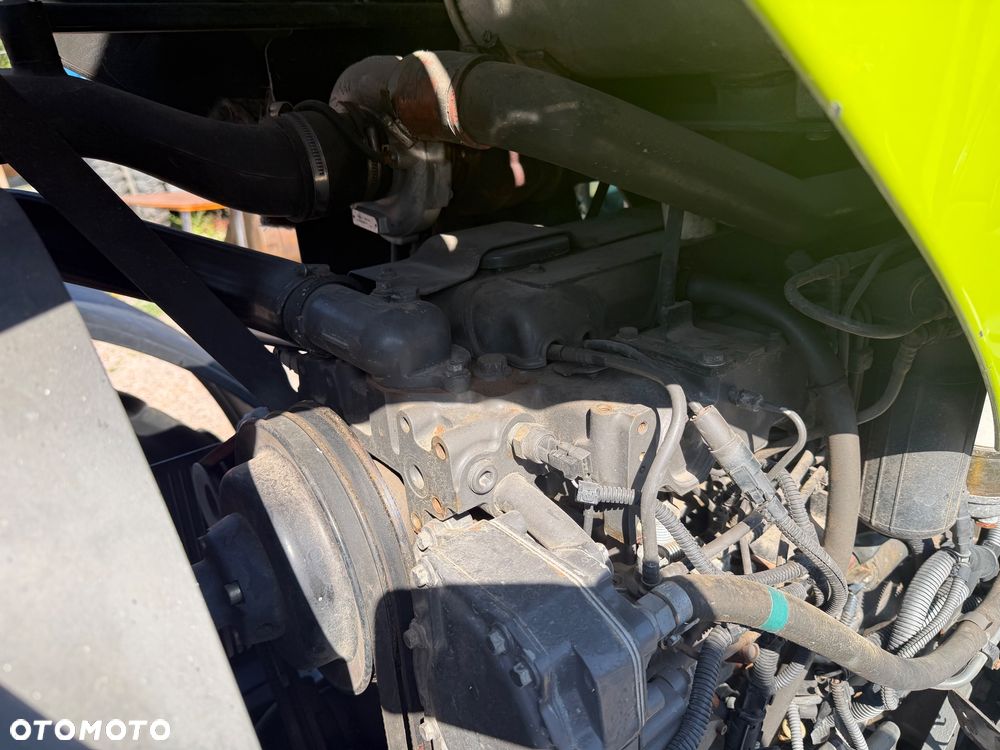 Claas Axos 320 - 14