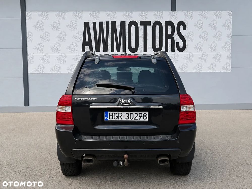 KIA SPORTAGE 2007 *SAMOCHÓD NA CZĘŚCI* 877 N BLACK PEARL MASKA, LAMPA, DRZWI, LUSTERKO, ZDERZAK, GRILL, BŁOTNIK, KLAPA, BELKA, DESKA, FOTELE, KANAPA, ĆWIARTKA KIEROWNICA, TARCZE, ZACISKI, ZAWIESZENIE, KOMPLETNY PRZÓD, KOMPLETNY TYŁ, LICZNIK, ZEGARY, PRAWE LEWE PRZÓD TYŁ