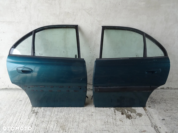 OPEL OMEGA B SEDAN DRZWI LEWY TYŁ LEWE TYLNE
