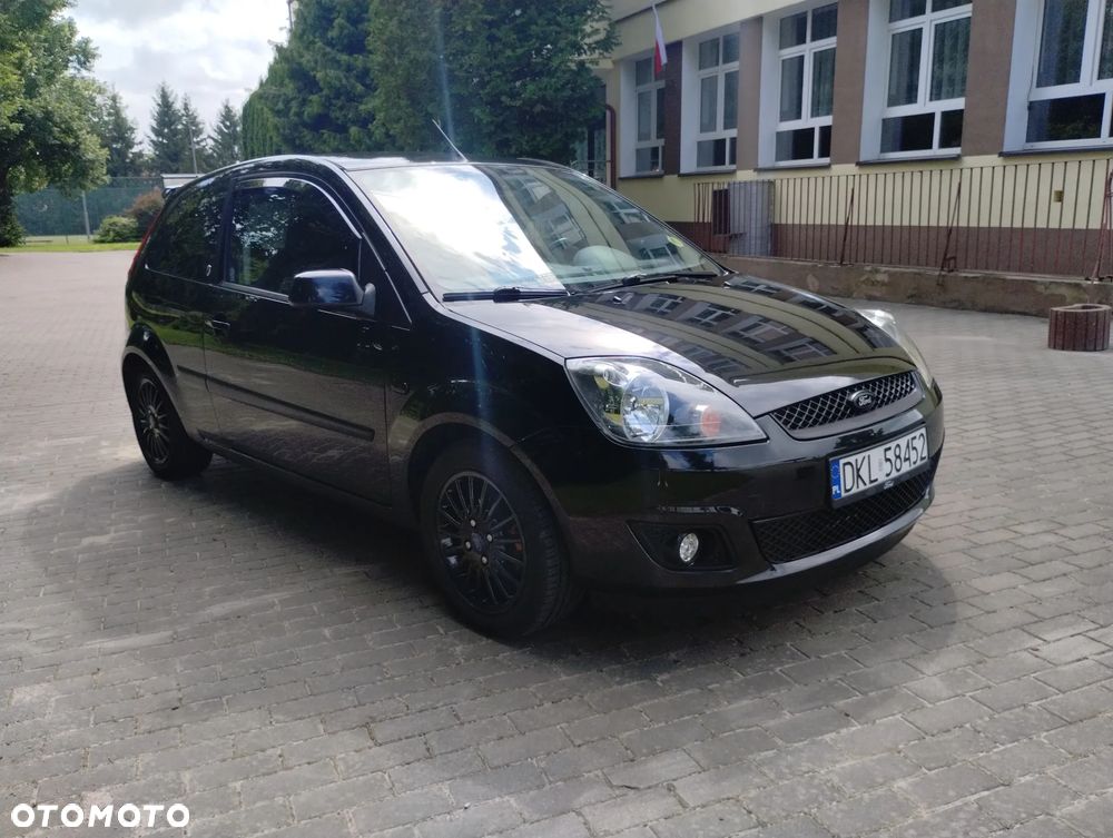 Ford Fiesta 1.4 Ghia - 12