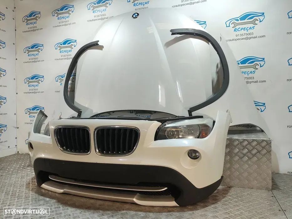 Frente Completa BMW X1 E84 - 2009 a 2015 - Parachoques | Guarda Lamas | Capot | Grelhas | Radiadores | Reforço | Fibra | Oticas | Sensores Estacionamento | Ventilador | S X Drive | Parachoque | Lama | Otica - 1