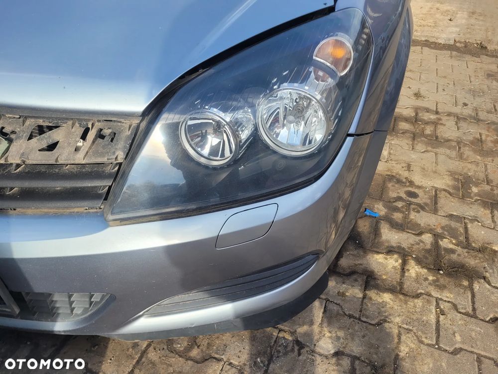 REFLEKTOR OPEL ASTRA  GTC LEWY PRZÓD - 1