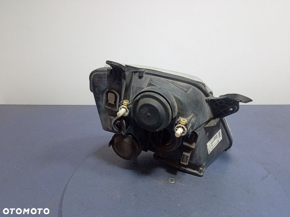 OPEL MERIVA A REFLEKTOR LEWY LAMPA EU 93321052 - 2