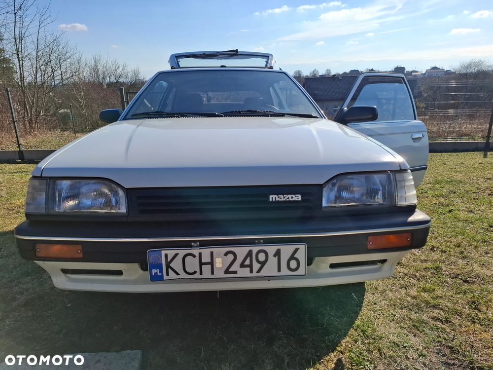 Mazda 323 1.3 LX - 18