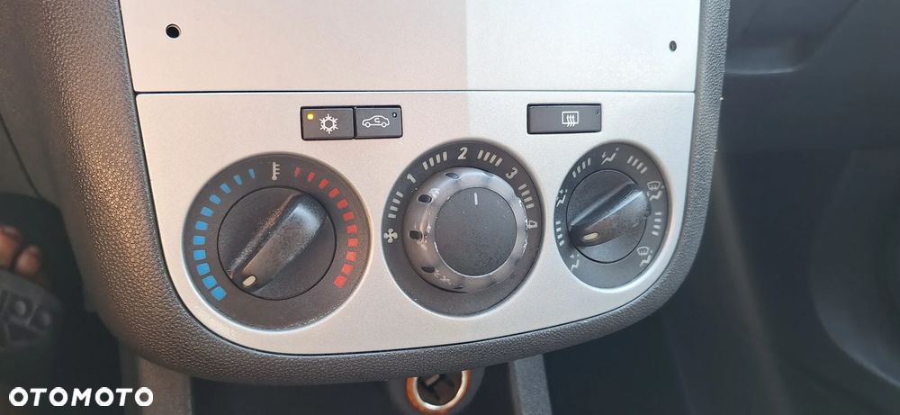 Opel Corsa 1.2 16V Enjoy - 12