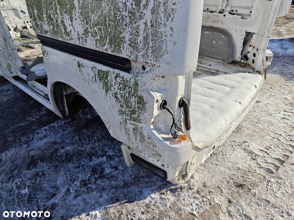 ĆWIARTKA BŁOTNIK LEWY TYŁ NISSAN NV200 - 2