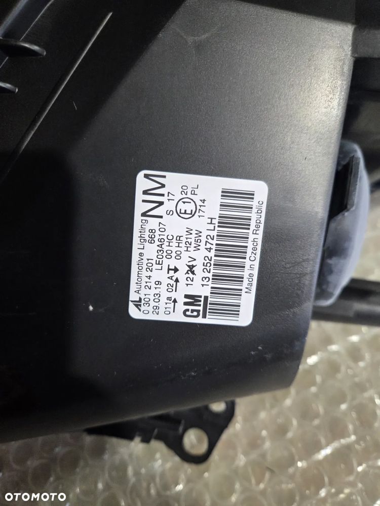 Lampa lewa przód przednia Opel Zafira B Lift 93190408 13252472 Reflektor lewy przód przedni Opel Zafira B Lift - 8