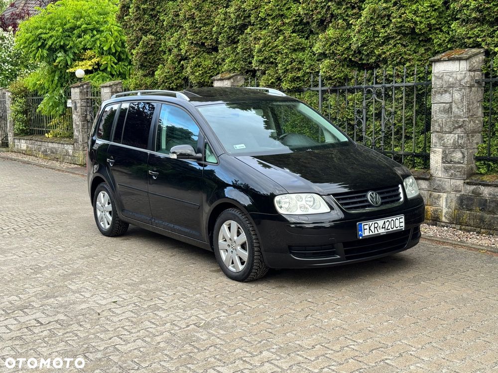 Volkswagen Touran 1.9 TDI Conceptline DSG - 1