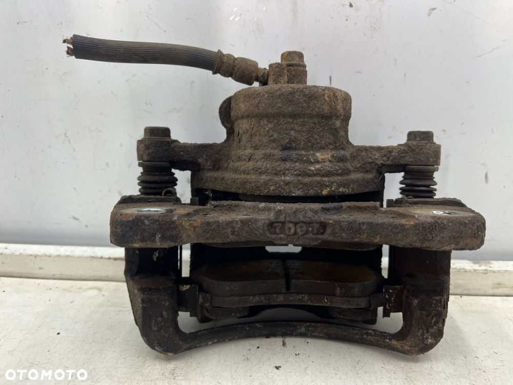 Zacisk hamulcowy Chevrolet Nubira III J200 05-12r. 2.0 cdi diesel lewy przedni jarzmo lewy przód - 6