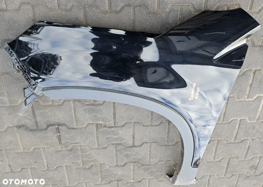 Kia Sorento II 2 błotnik przód przedni  lewy  EB - 2