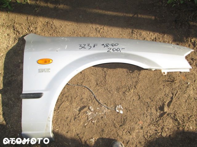 BŁOTNIK MAZDA 323 F 98-00 PRAWY - 1