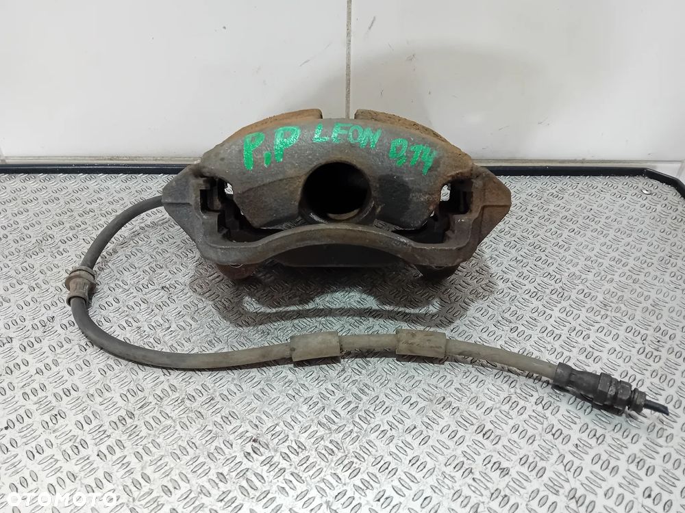 zacisk hamulcowy prawy przód Seat Leon III kombi 2014 - 1