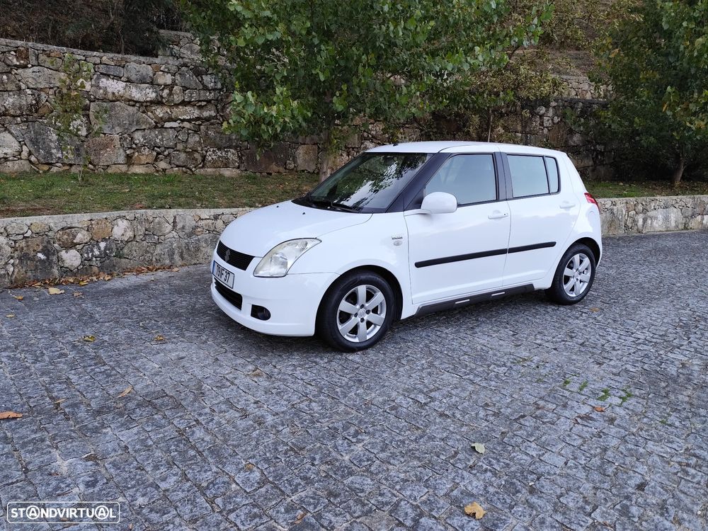 Suzuki Swift 1.3 DDiS Quiksilver - 3