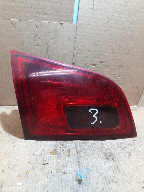} LAMPA TYLNA LEWA OPEL ASTRA J KOMBI nr 13282248 / 13282246