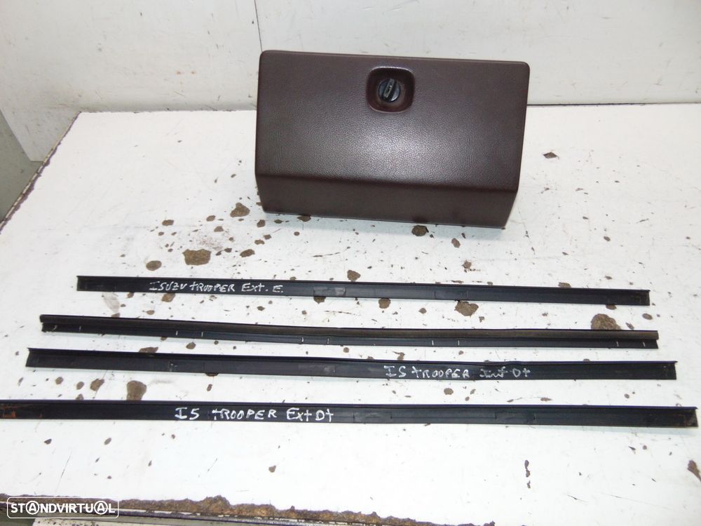 Isuzu trooper porta luvas/Raspadores - 1
