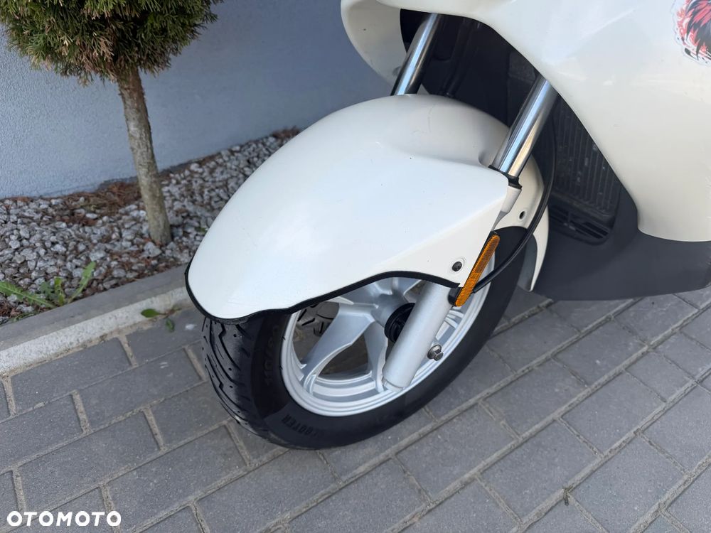 Suzuki Burgman - 34