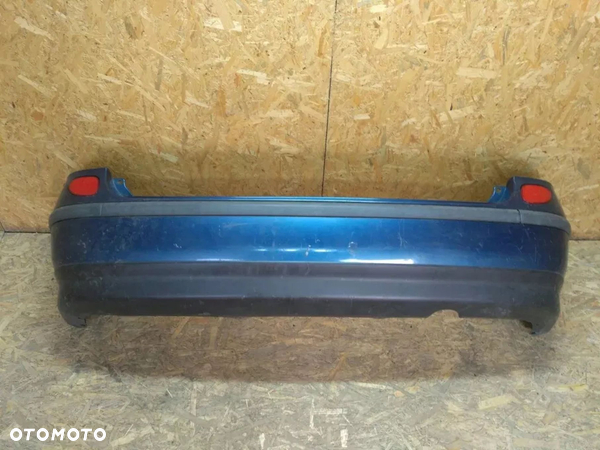 NISSAN ALMERA TINO ZDErzak tylny tył odblaski