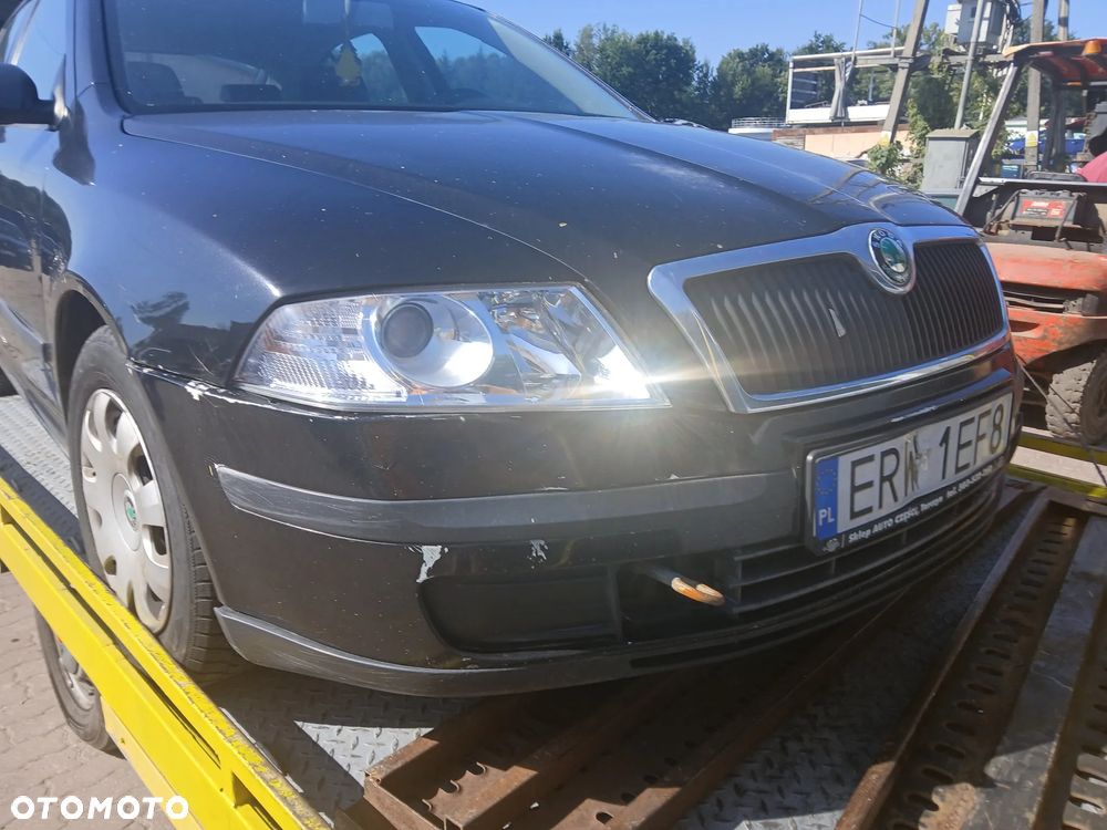 Skoda Octavia II HB 1Z1Z  maska pokrywa silnika klapa bagażnika zderzak lampa reflektor pas przedni stop lampy halogeny przeciwmgłowe odblaski grill atrapa - 1